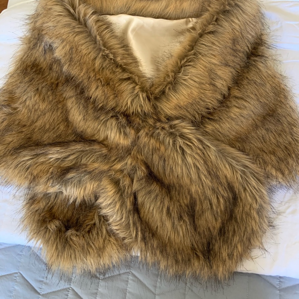 Cover up Carmel faux fur with hints of blk